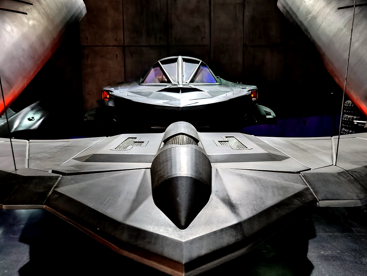 Legendary Batmobile vehicles on display in the Warner Bros. movie museum