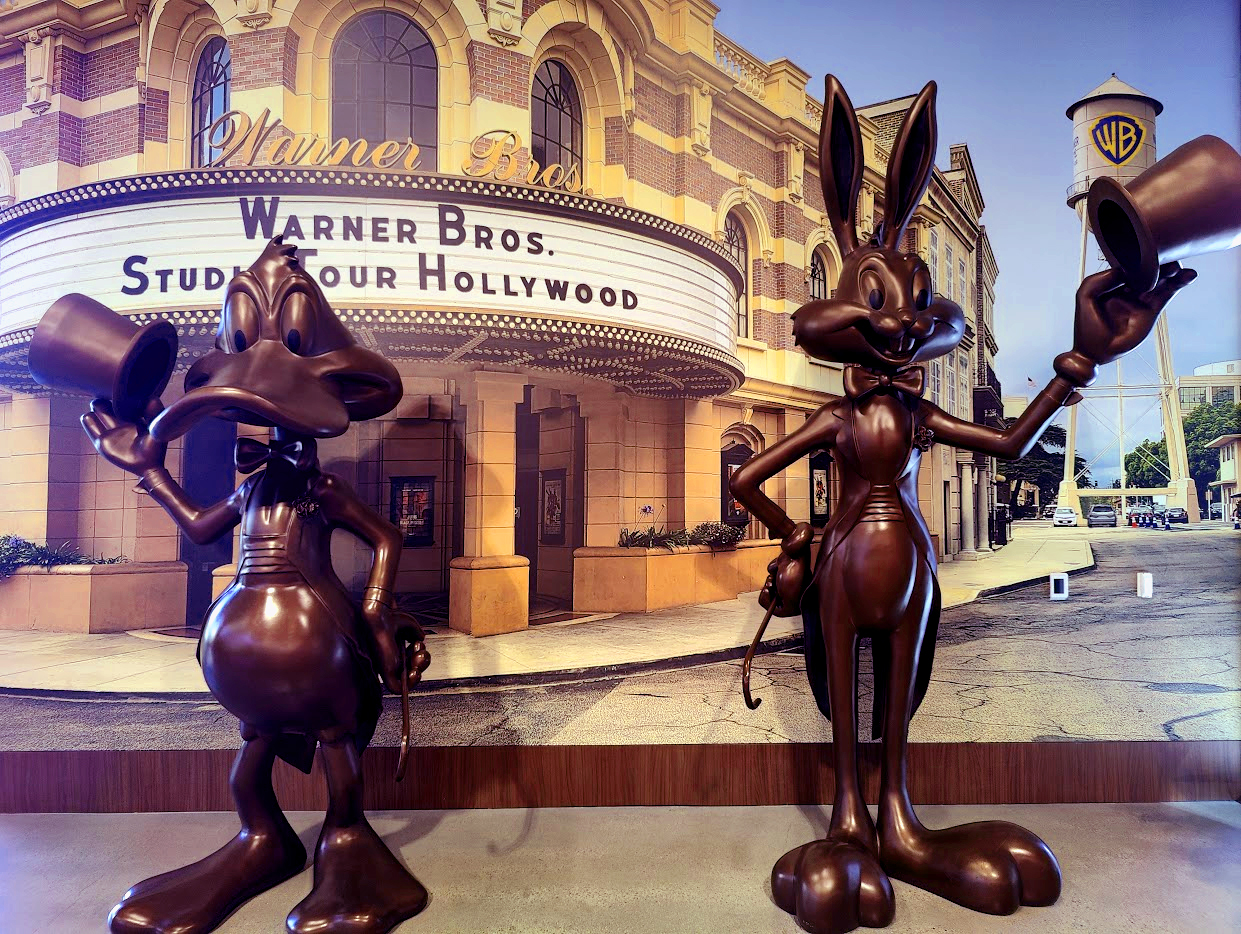 Classic Looney Tunes animation statues welcoming studio tour guests