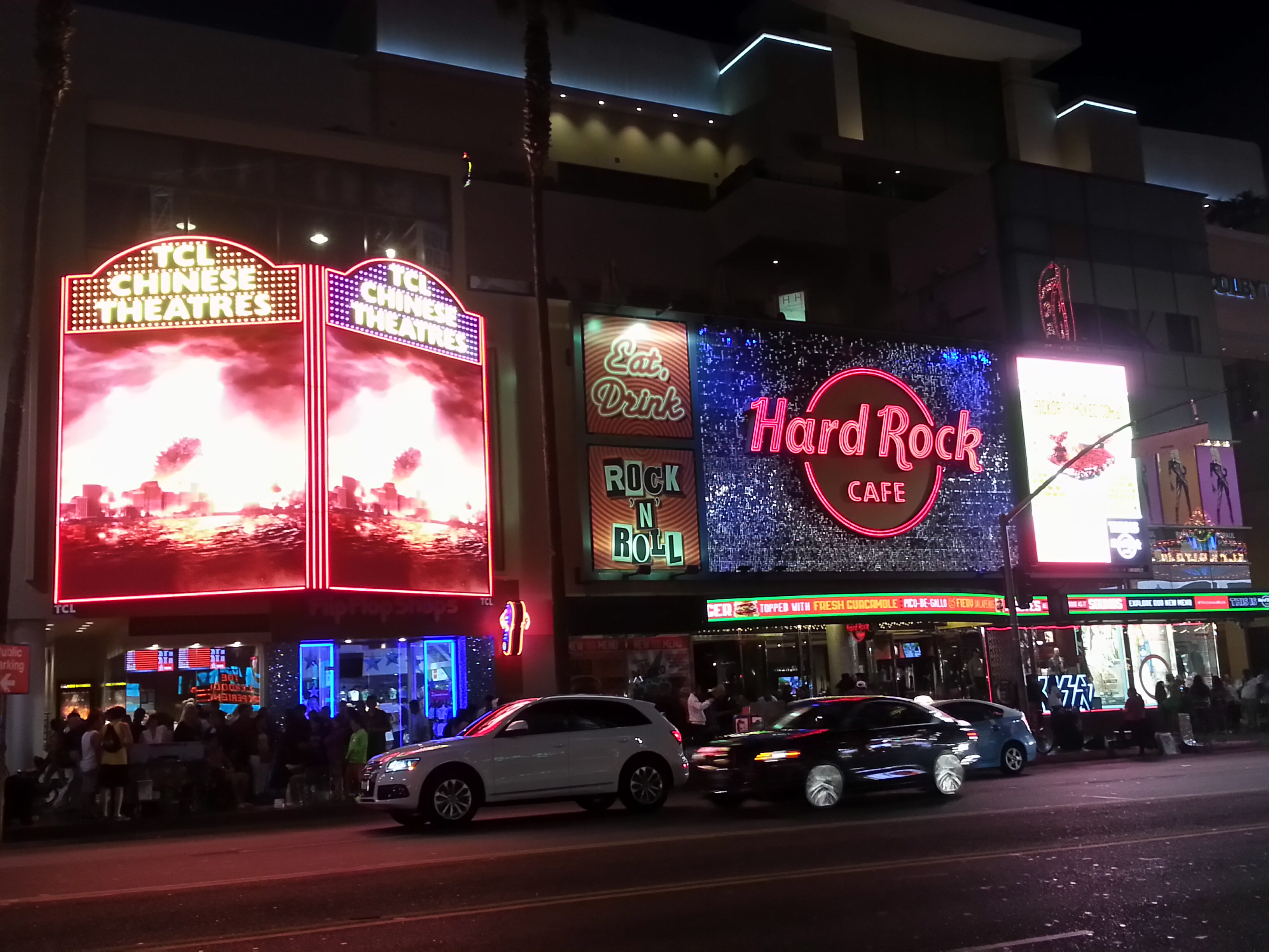 Hollywood Boulevard illuminated neon marquees and evening city lights